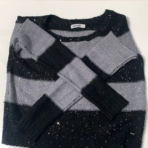 Lightly worn sparkle long sleeve.